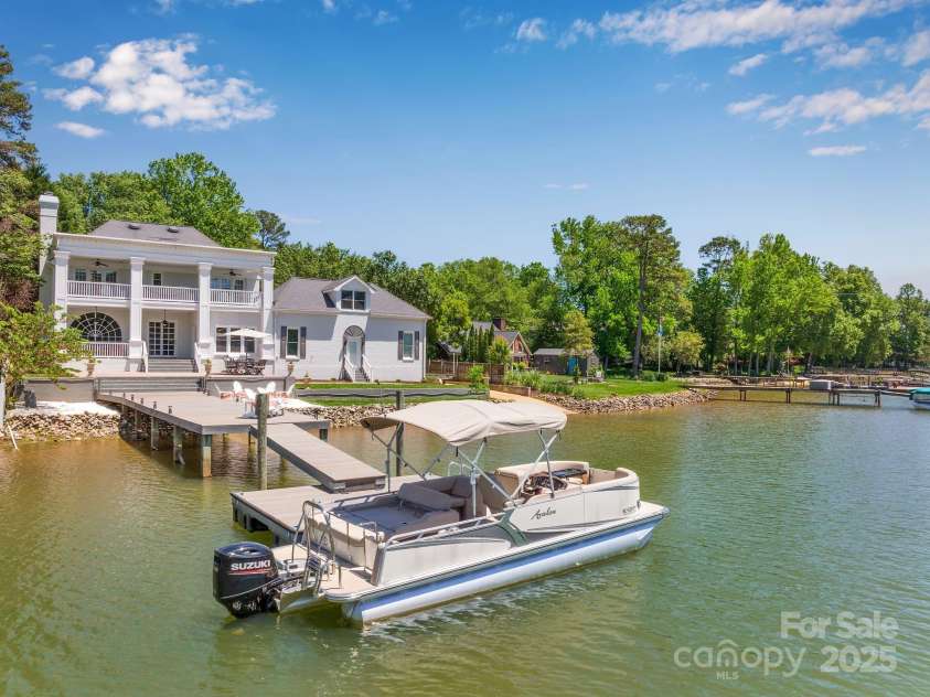 8150 Malibu Pointe Lane, Denver, NC 28037.  MLS# CAR4234717, YatesRealty ID 5468. Water plenty deep to store boat year-round