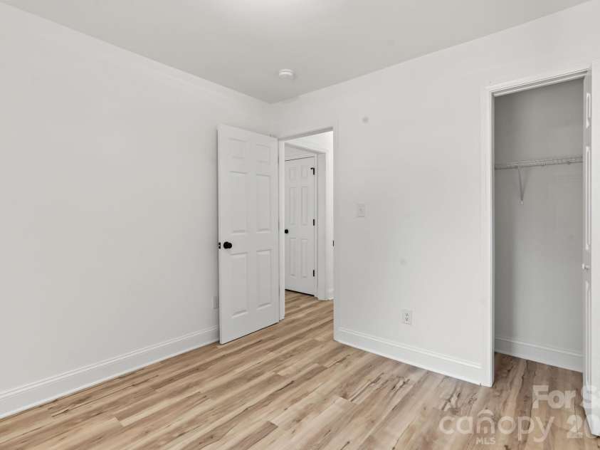 2825 Mayfair Avenue, Charlotte, NC 28208.  MLS# CAR4430334, YatesRealty ID 54687. Guest Bed 1