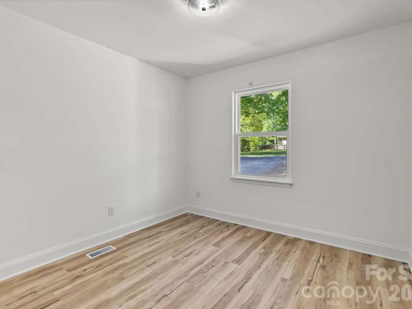 2825 Mayfair Avenue, Charlotte, NC 28208.  MLS# CAR4430334, YatesRealty ID 54687. Guest Bed 1 Main FloorGue