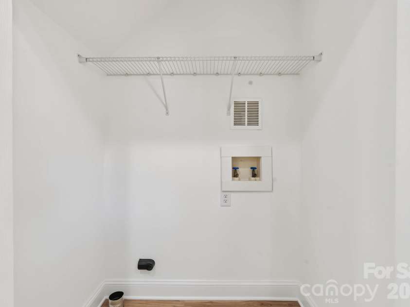 2825 Mayfair Avenue, Charlotte, NC 28208.  MLS# CAR4430334, YatesRealty ID 54687. Laundry Closet on Main Floor