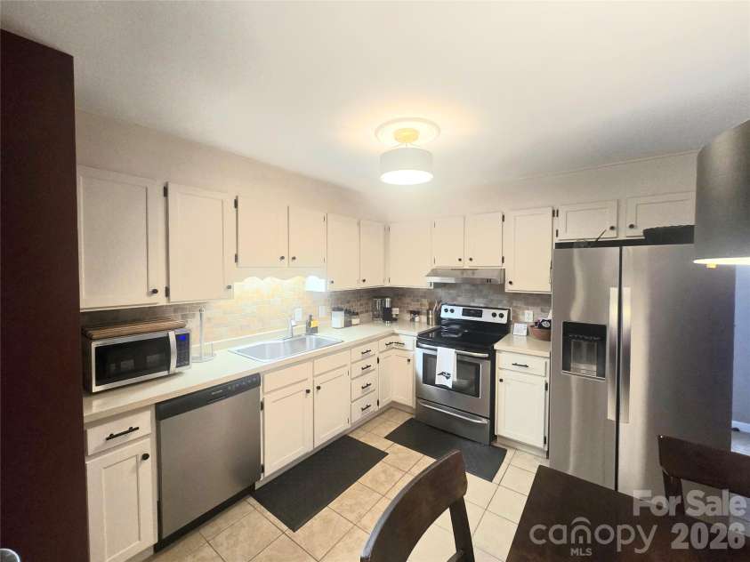 475 Spring Avenue, Newton, NC 28658.  MLS# CAR4430366, YatesRealty ID 54695. 