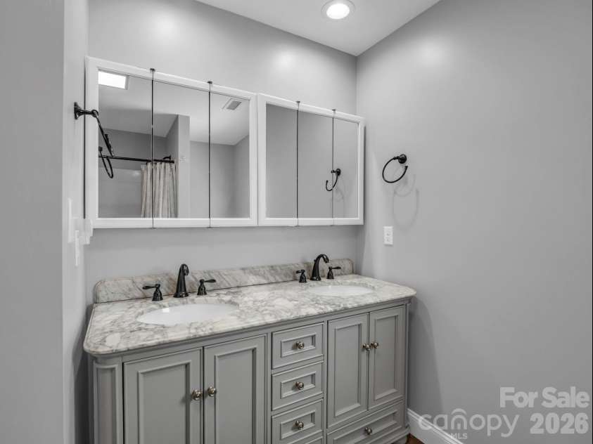 131 Burch Hutchins Road, Forest City, NC 28043.  MLS# CAR4430340, YatesRealty ID 54697. Primary bath has double vanity