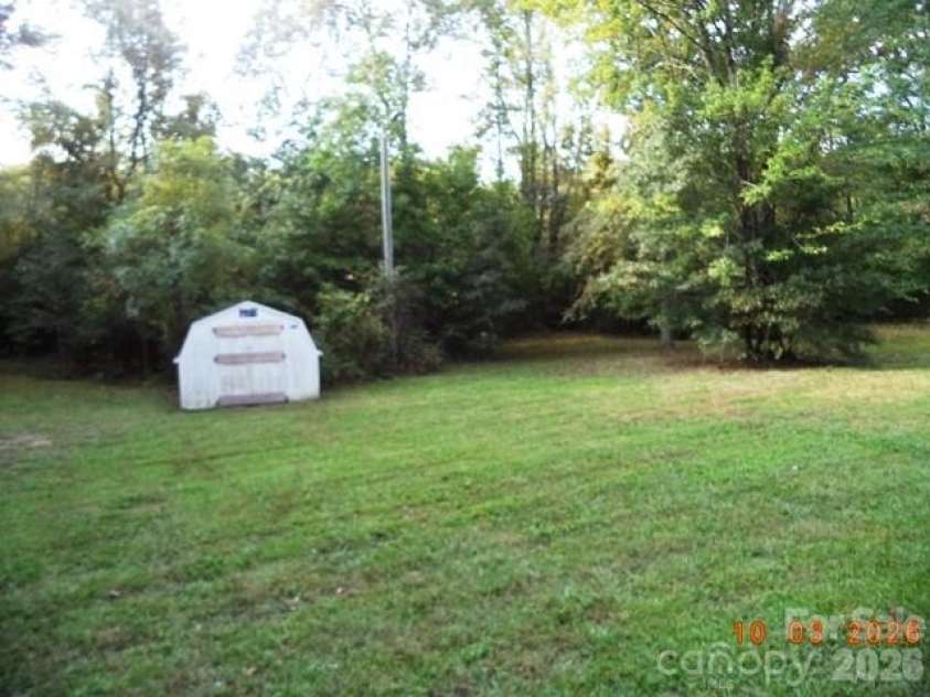 115 Hawkins Avenue, Salisbury, NC 28144.  MLS# CAR4431192, YatesRealty ID 54728. Yard