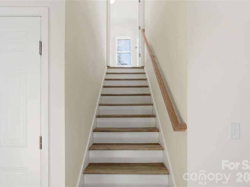 2881 Kiser Road, Winston Salem, NC 27106.  MLS# CAR4352028, YatesRealty ID 5473. Stairs to upper level