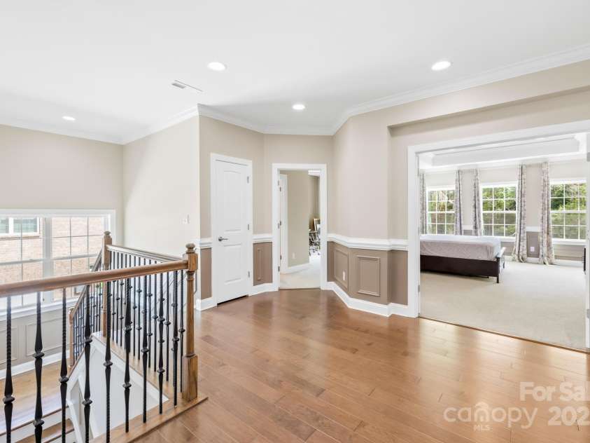 705 Brown Creek Drive, Matthews, NC 28104.  MLS# CAR4244288, YatesRealty ID 5473. 2nd Level Gallery - Approach to Owner's Suite