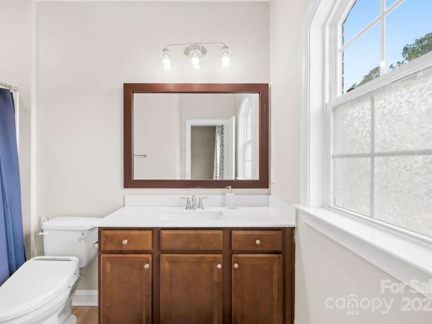 705 Brown Creek Drive, Matthews, NC 28104.  MLS# CAR4244288, YatesRealty ID 5473. Bath Attached to Bedroom 3