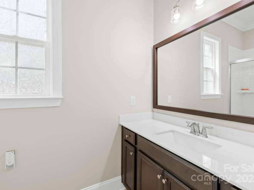 705 Brown Creek Drive, Matthews, NC 28104.  MLS# CAR4244288, YatesRealty ID 5473. First Level Attached Bath