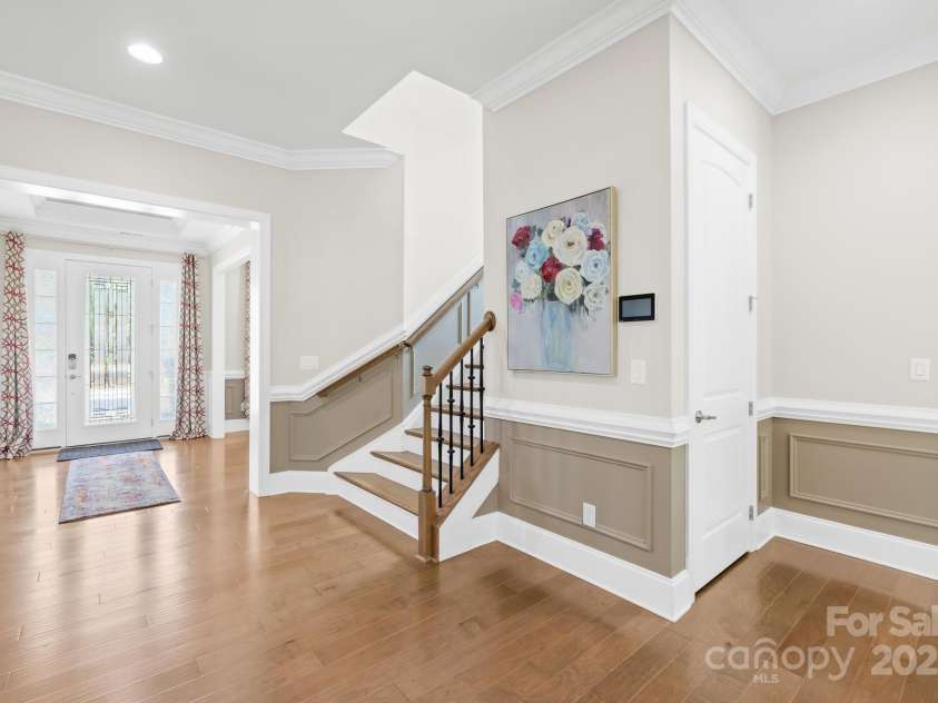 705 Brown Creek Drive, Matthews, NC 28104.  MLS# CAR4244288, YatesRealty ID 5473. Gallery Area (Stairway to 2nd Level)