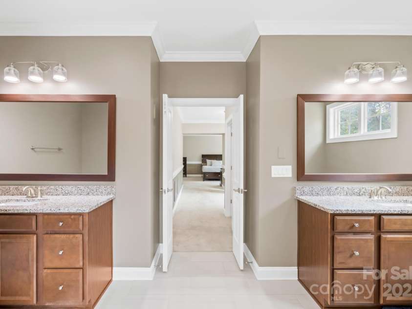 705 Brown Creek Drive, Matthews, NC 28104.  MLS# CAR4244288, YatesRealty ID 5473. Master Batch with Framed Mirrors