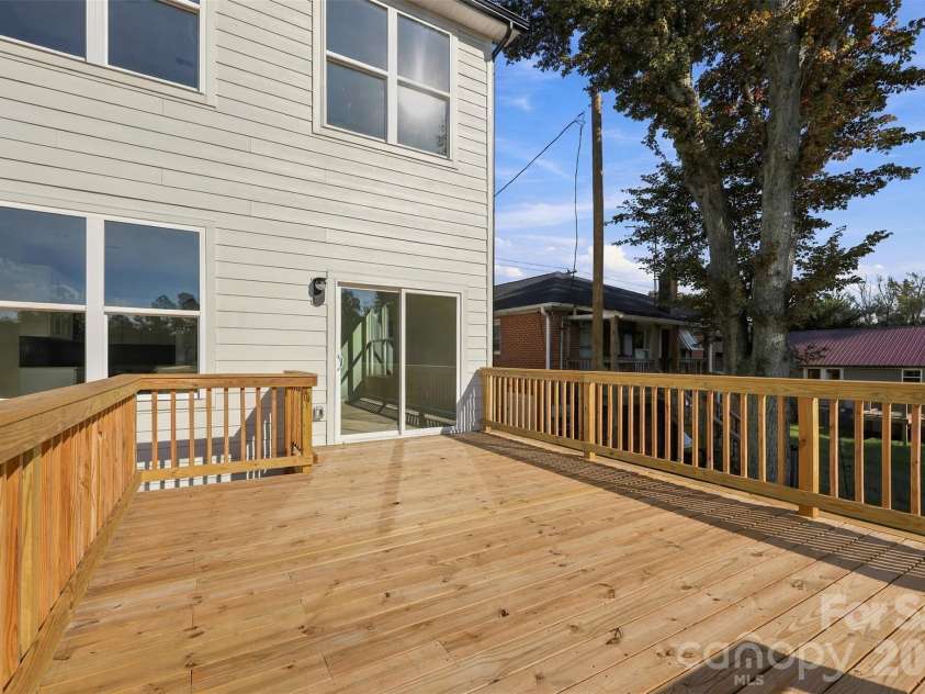 606 Broad Street, Mooresville, NC 28115.  MLS# CAR4431247, YatesRealty ID 54736. Large back deck