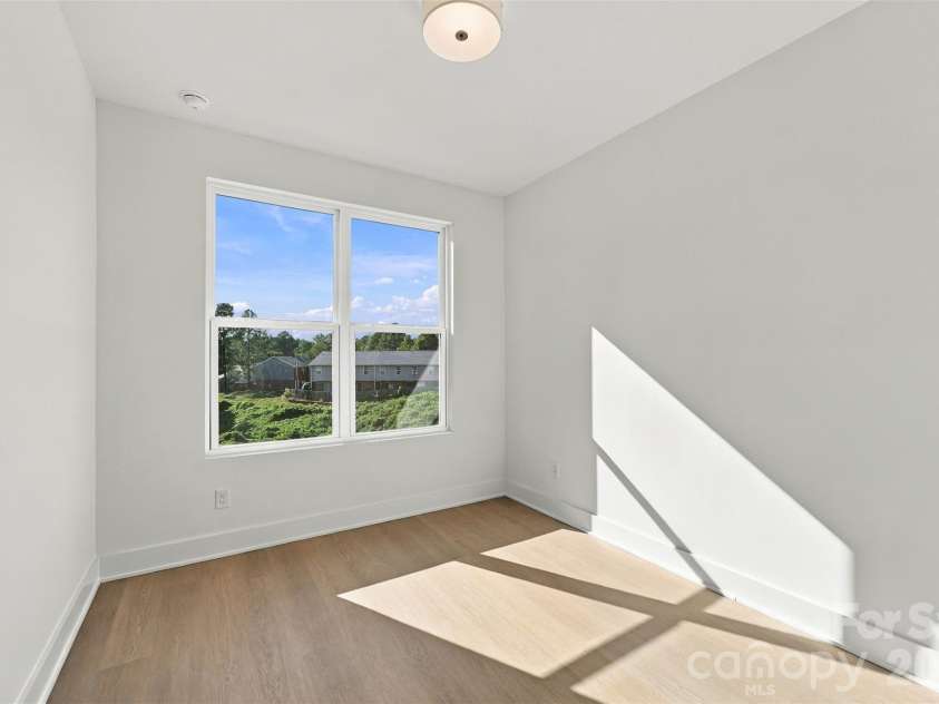 606 Broad Street, Mooresville, NC 28115.  MLS# CAR4431247, YatesRealty ID 54736. Third bedroom on upper