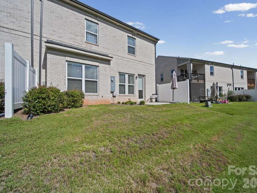 203 Heathbrook Lane, Waxhaw, NC 28173.  MLS# CAR4429780, YatesRealty ID 54740. Back