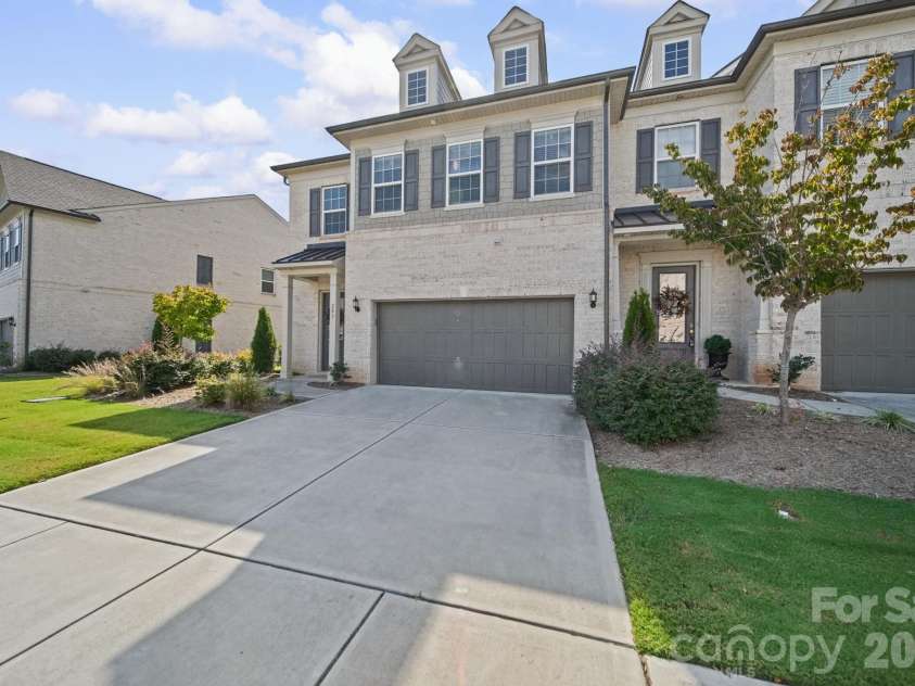 203 Heathbrook Lane, Waxhaw, NC 28173.  MLS# CAR4429780, YatesRealty ID 54740. Front, with a double garage