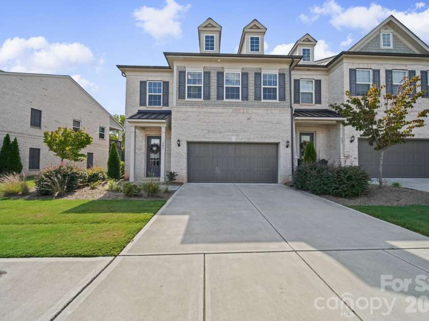 203 Heathbrook Lane, Waxhaw, NC 28173.  MLS# CAR4429780, YatesRealty ID 54740. Front, with a double garage