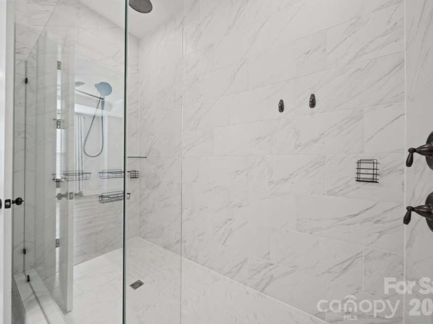 203 Heathbrook Lane, Waxhaw, NC 28173.  MLS# CAR4429780, YatesRealty ID 54740. Primary Full bathroom