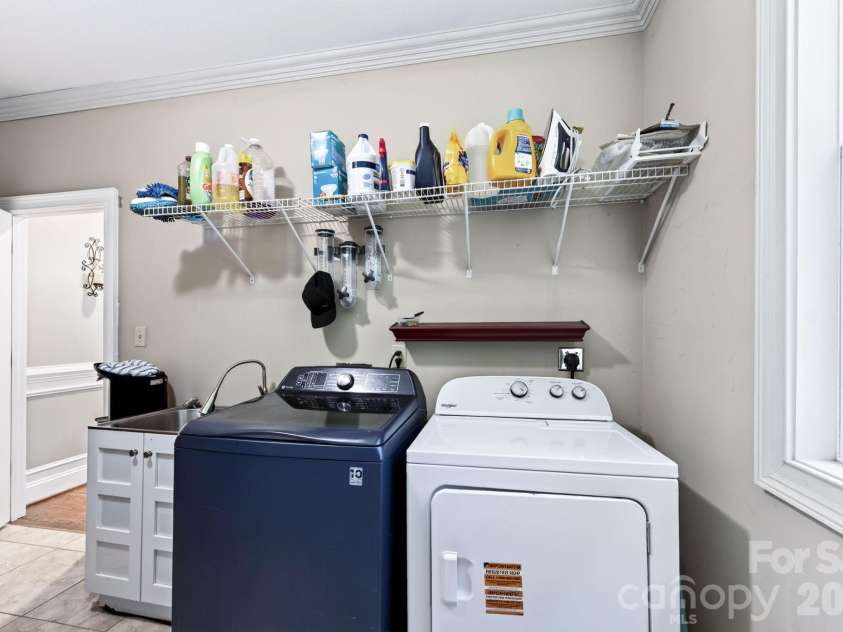 73 Rose Of Sharon Way, Candler, NC 28715.  MLS# CAR4417283, YatesRealty ID 54754. Main Level Laundry Room