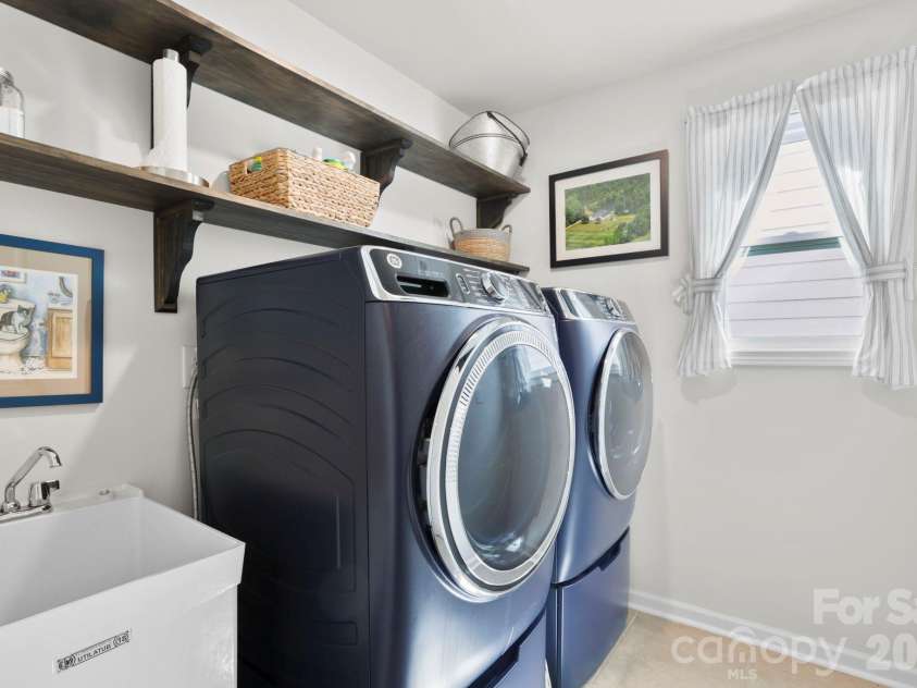 265 Fox Cove Road, Hendersonville, NC 28792.  MLS# CAR4356142, YatesRealty ID 5476. Laundry room 