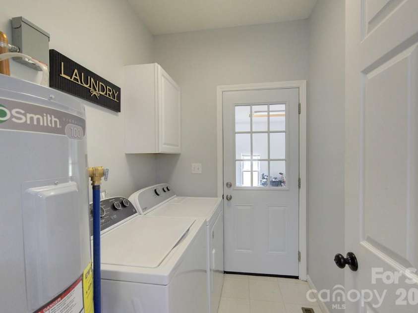 60 Golden Lane, Leicester, NC 28748.  MLS# CAR4429246, YatesRealty ID 54773. Laundry Mudroom