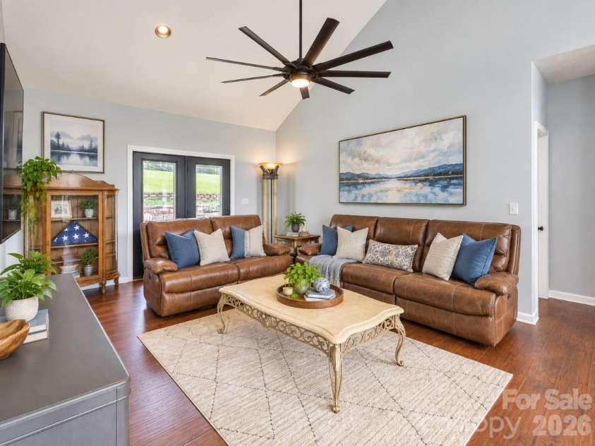 60 Golden Lane, Leicester, NC 28748.  MLS# CAR4429246, YatesRealty ID 54773. Living VE with artwork