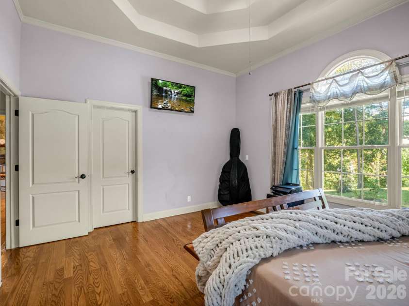61 Mountain Shadows Drive, Leicester, NC 28748.  MLS# CAR4431319, YatesRealty ID 54790. Primary Bedroom