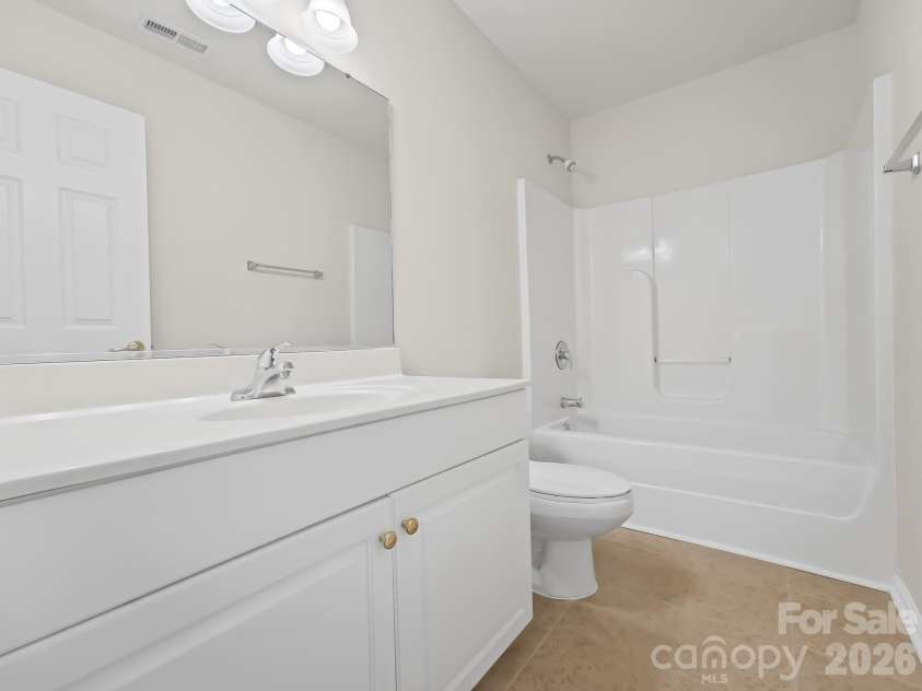 15 Chowan Drive, Fletcher, NC 28732.  MLS# CAR4430498, YatesRealty ID 54797. Full bath upstairs shared by two bedrooms