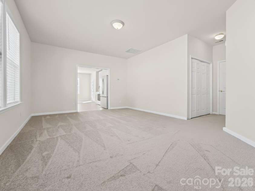 15 Chowan Drive, Fletcher, NC 28732.  MLS# CAR4430498, YatesRealty ID 54797. So much space in this living room that opens to the kitchen