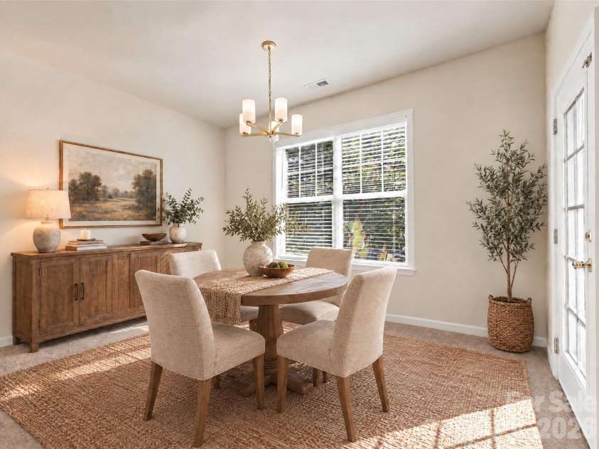 15 Chowan Drive, Fletcher, NC 28732.  MLS# CAR4430498, YatesRealty ID 54797. Virtually staged dining area