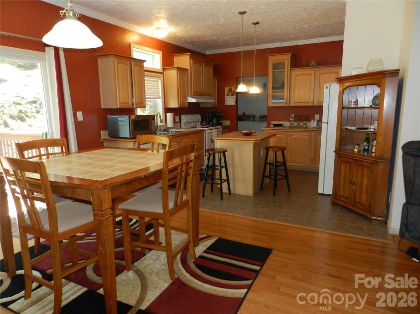 3 Lauren Lane, Candler, NC 28715.  MLS# CAR4421667, YatesRealty ID 54800. Dining/Kitchen View 1