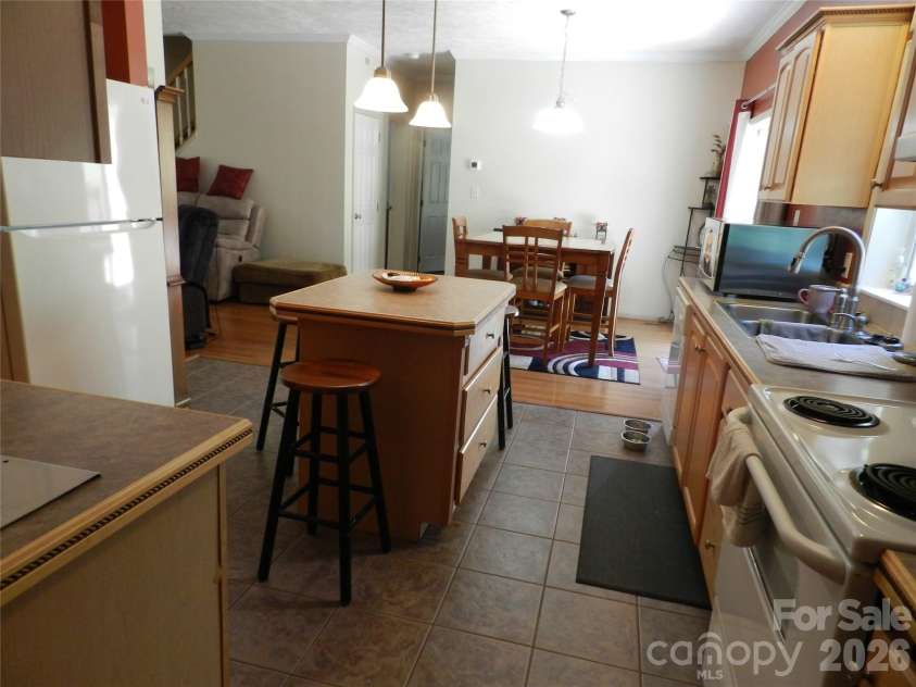 3 Lauren Lane, Candler, NC 28715.  MLS# CAR4421667, YatesRealty ID 54800. Kitchen View 3