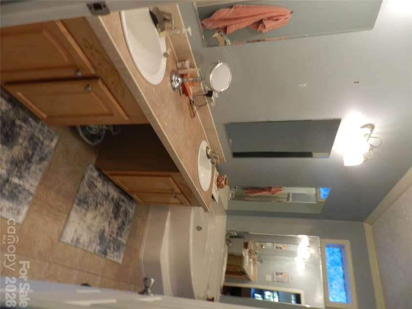 3 Lauren Lane, Candler, NC 28715.  MLS# CAR4421667, YatesRealty ID 54800. Master Bath View 1