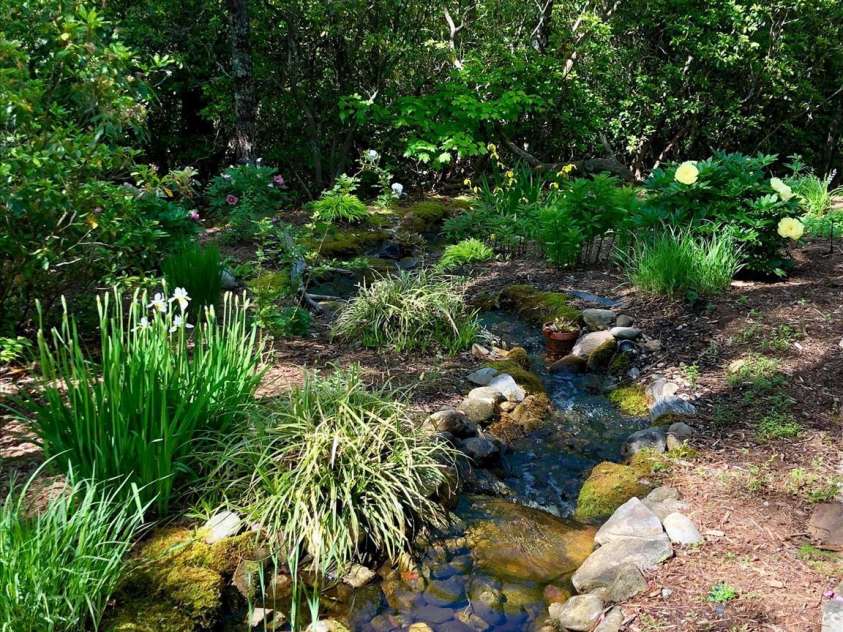 44 Sunset Trace, Brevard, NC 28712.  MLS# CAR4429326, YatesRealty ID 54809. Soothing sounds water feature