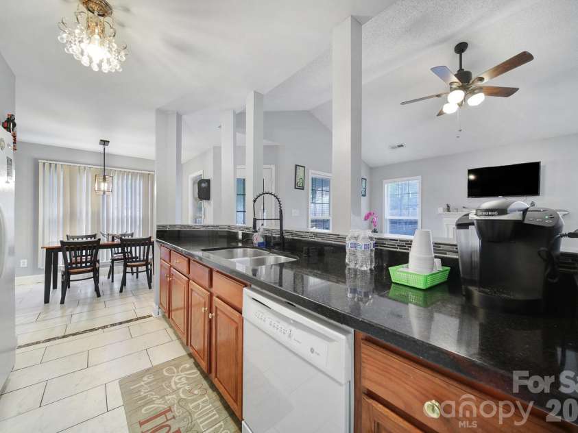 713 Pesca Lane, Matthews, NC 28104.  MLS# CAR4431408, YatesRealty ID 54821. 