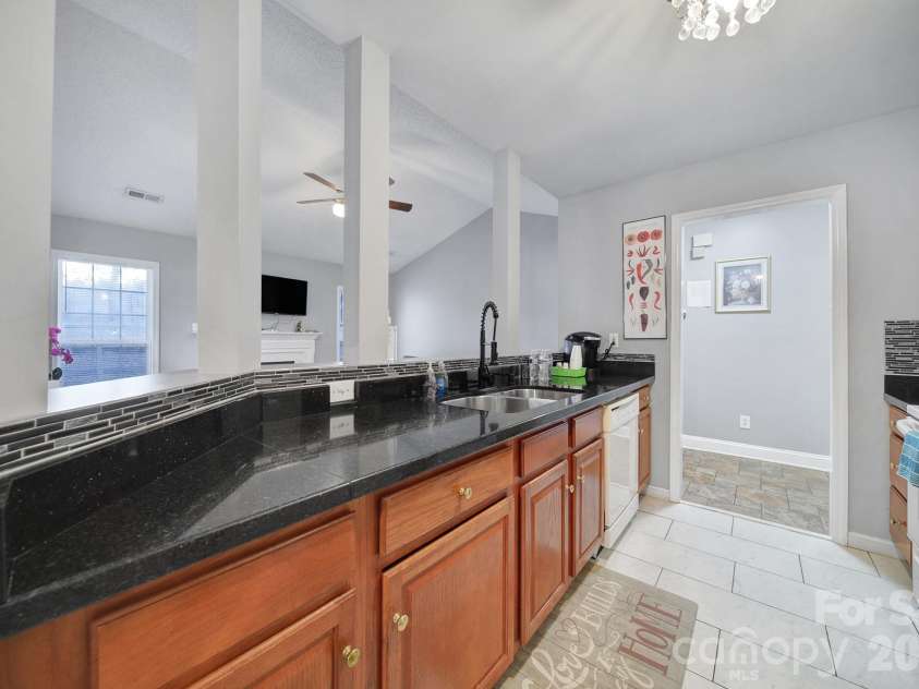 713 Pesca Lane, Matthews, NC 28104.  MLS# CAR4431408, YatesRealty ID 54821. 