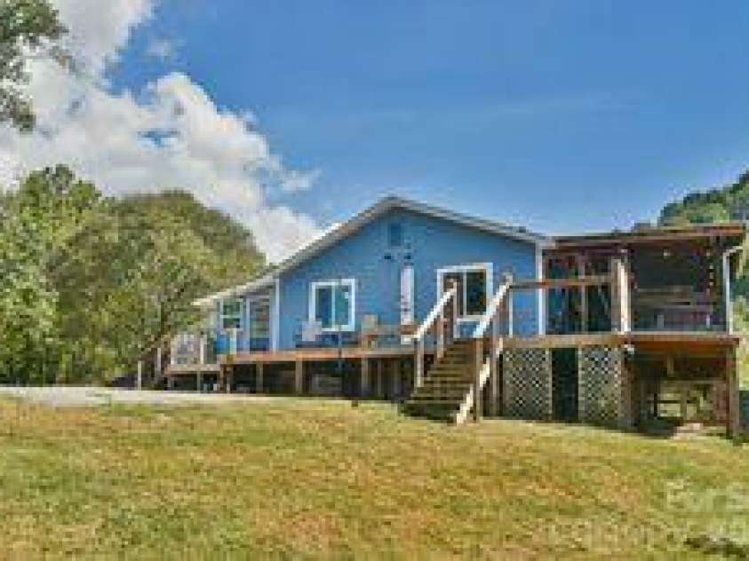 456 Morgan Branch Road, Marshall, NC 28753.  MLS# CAR4431292, YatesRealty ID 54823. Back deck