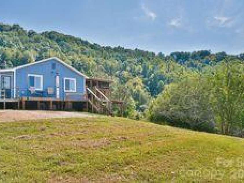 456 Morgan Branch Road, Marshall, NC 28753.  MLS# CAR4431292, YatesRealty ID 54823. North side of house