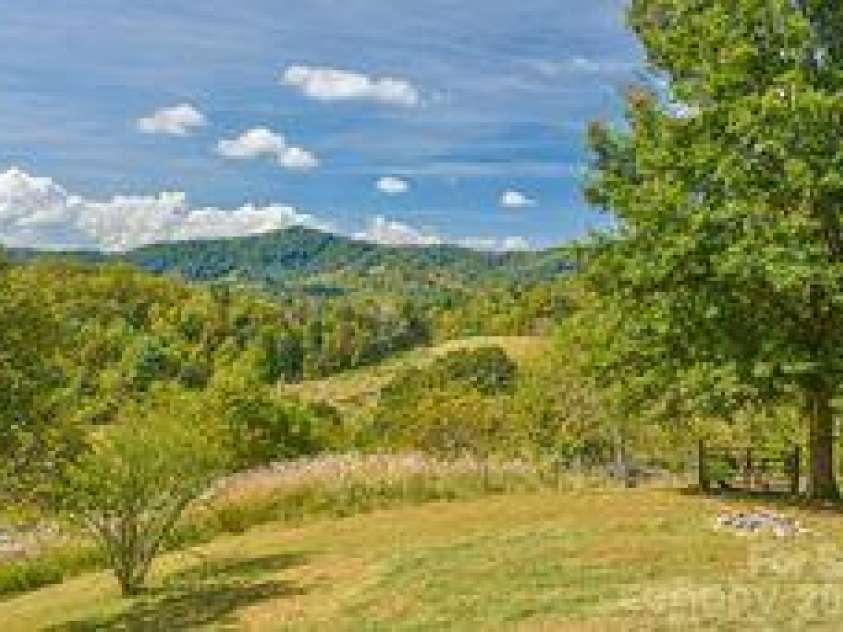 456 Morgan Branch Road, Marshall, NC 28753.  MLS# CAR4431292, YatesRealty ID 54823. Pastoral setting