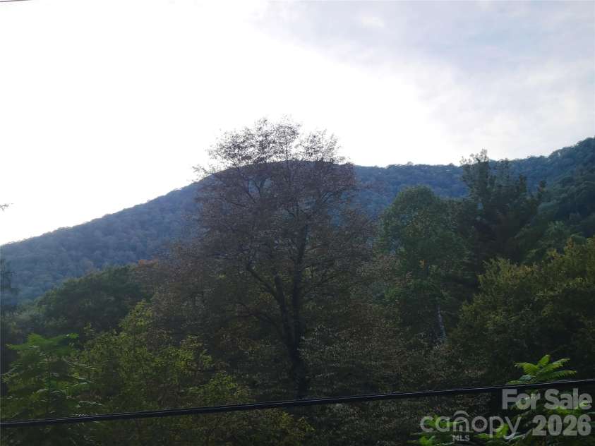1061 Caldwell Drive, Maggie Valley, NC 28751.  MLS# CAR4429687, YatesRealty ID 54829. 