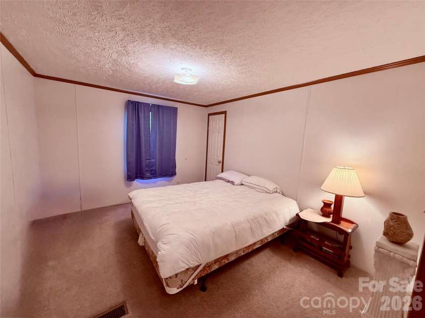 878 GW G W Whitmire Road, Rosman, NC 28772.  MLS# CAR4427358, YatesRealty ID 54831. Bedroom 2
