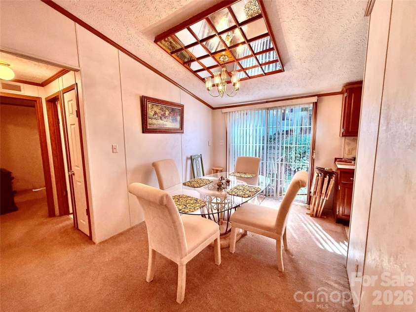 878 GW G W Whitmire Road, Rosman, NC 28772.  MLS# CAR4427358, YatesRealty ID 54831. Bright Dining Room