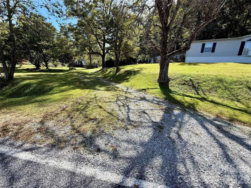 878 GW G W Whitmire Road, Rosman, NC 28772.  MLS# CAR4427358, YatesRealty ID 54831. Paved Frontage/Easy Access