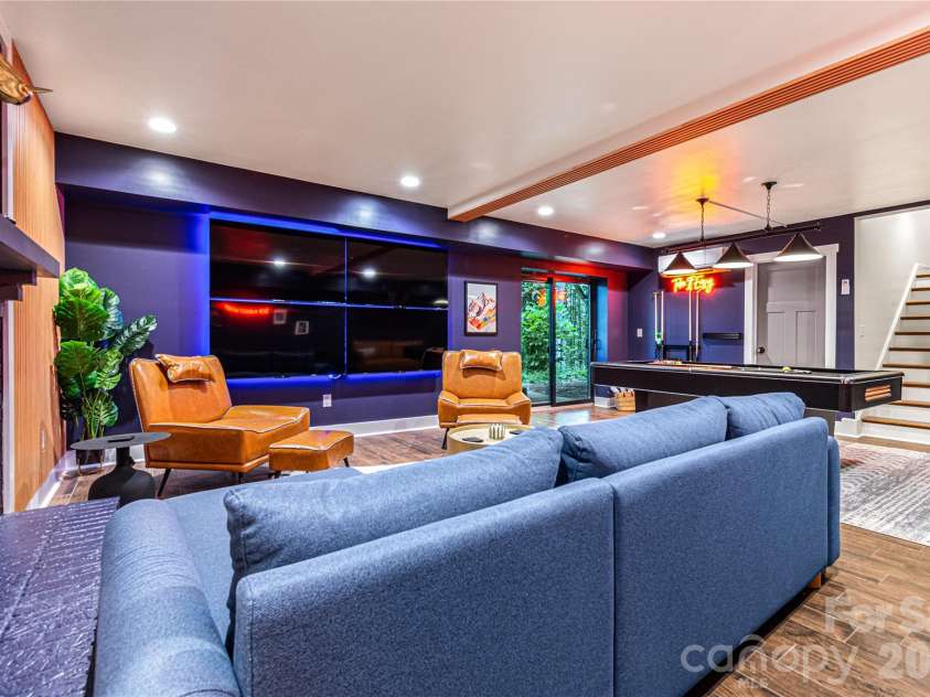 840 Jenkins Valley Road, Alexander, NC 28701.  MLS# CAR4370016, YatesRealty ID 54834. Downstairs - Game Room