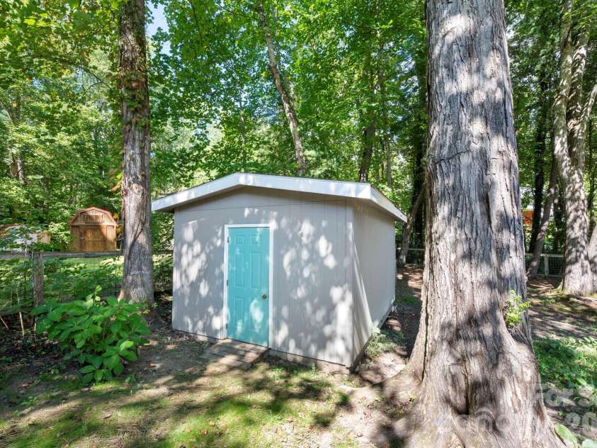 340 Genesis Circle, Black Mountain, NC 28711.  MLS# CAR4429667, YatesRealty ID 54851. Exterior Storage Shed
