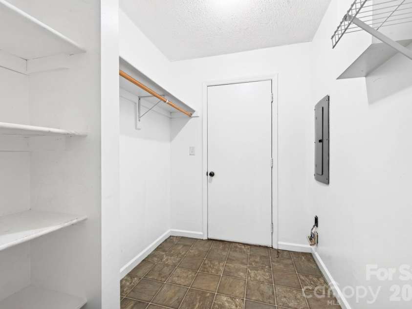 340 Genesis Circle, Black Mountain, NC 28711.  MLS# CAR4429667, YatesRealty ID 54851. Primary Bedroom Closet with Exterior Access