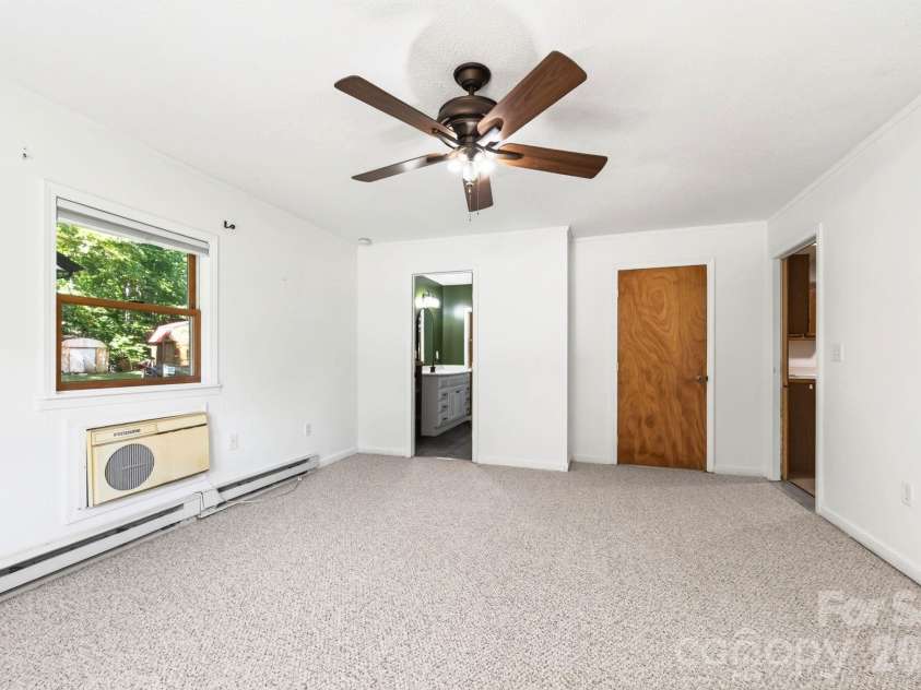 340 Genesis Circle, Black Mountain, NC 28711.  MLS# CAR4429667, YatesRealty ID 54851. Primary Bedroom with Walk-in Closet