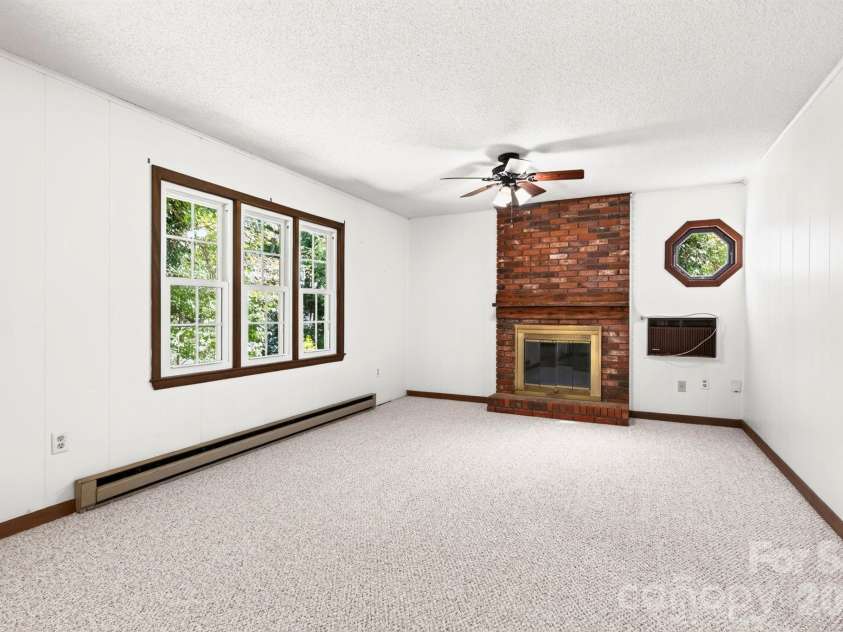340 Genesis Circle, Black Mountain, NC 28711.  MLS# CAR4429667, YatesRealty ID 54851. Wood Burning Fireplace