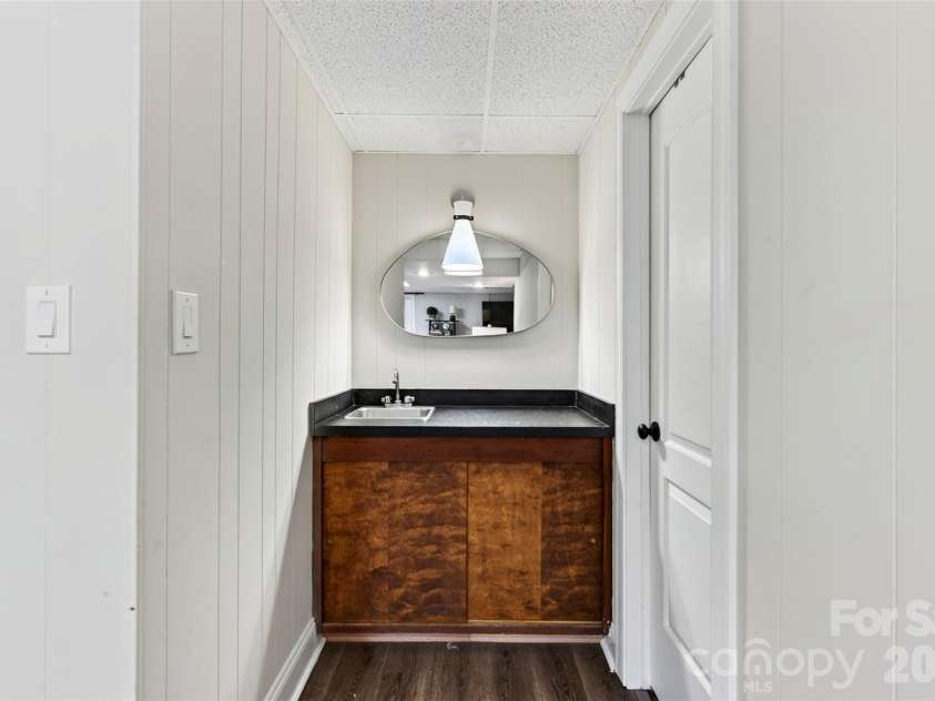 14 Willow Road, Asheville, NC 28804.  MLS# CAR4429269, YatesRealty ID 54853. Basement wet bar