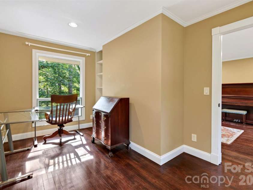 14 Willow Road, Asheville, NC 28804.  MLS# CAR4429269, YatesRealty ID 54853. Dedicated office or flex room with built -in shelves
