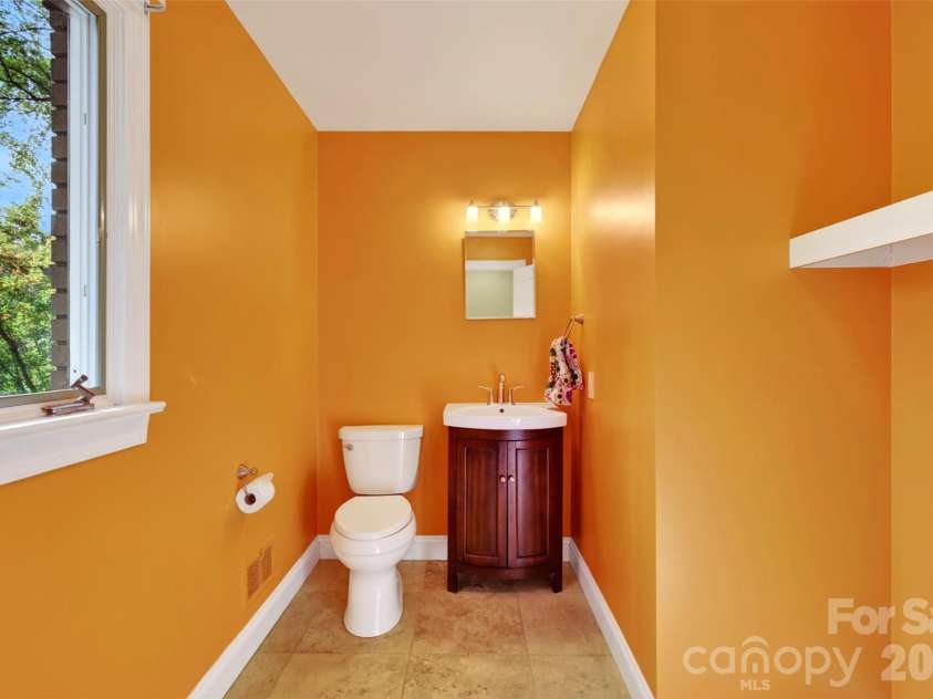 14 Willow Road, Asheville, NC 28804.  MLS# CAR4429269, YatesRealty ID 54853. Main floor powder room has laundry access