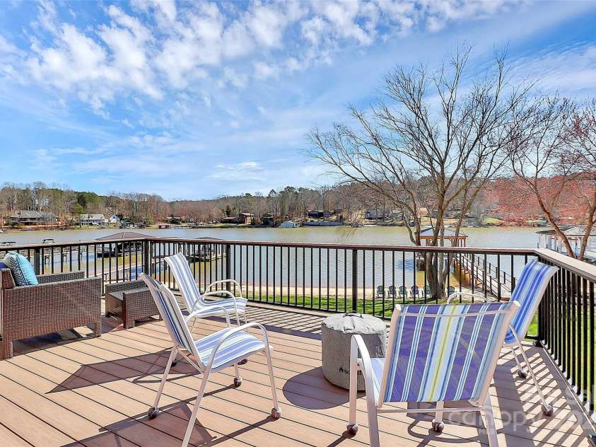 126 Anchor Lane, Troutman, NC 28166.  MLS# CAR4228228, YatesRealty ID 5486. DECK OFF of the GREAT ROOM-VIEW THE LAKE