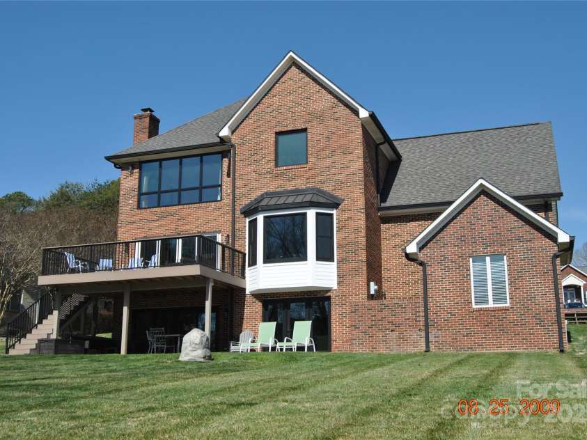 126 Anchor Lane, Troutman, NC 28166.  MLS# CAR4228228, YatesRealty ID 5486. REAR OF HOME with COVERED PATIO